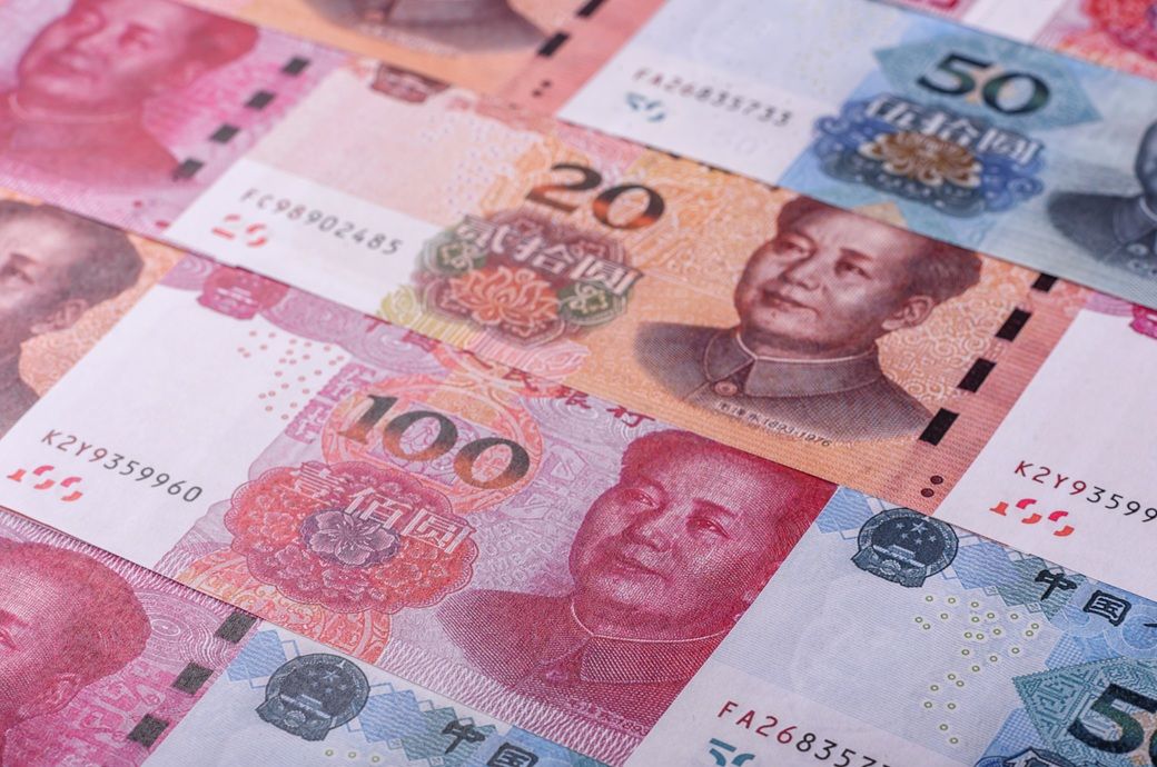 China maintains benchmark lending rates despite global oil surge